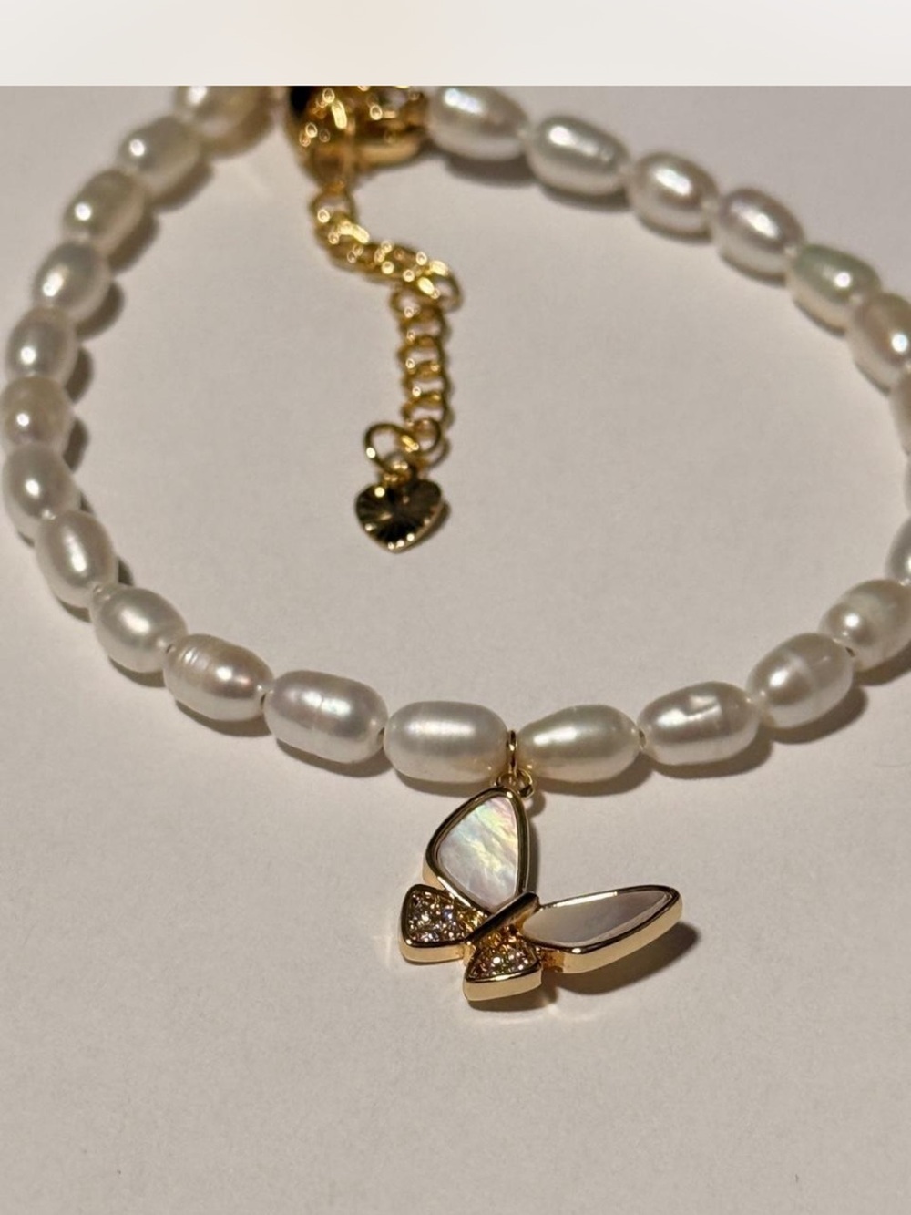 Handmade Freshwater Pearl Bracelet with Gold Butterfly Charm - White